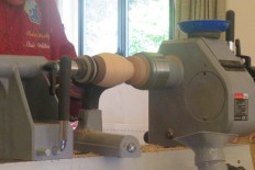 Using a live center to assist turning the outside